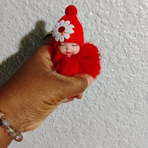 Charming Red Baby Doll with Flower Hat